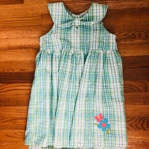Super sweet plaid girls dress with floral detail